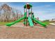 Neighborhood playground featuring a green slide, climbing wall and soft landing at 567 Hidden Hills Dr, Pittsboro, IN 46167