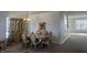 Dining room with traditional furniture, and a view into the living room at 6405 Oyster Key Ln, Plainfield, IN 46168