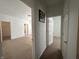 Hallway providing flow to the bedrooms, closets and bathrooms of the house at 6405 Oyster Key Ln, Plainfield, IN 46168