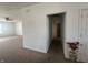 Spacious living room with neutral carpet and ample natural light ready for your personal touch at 6405 Oyster Key Ln, Plainfield, IN 46168