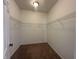 Large walk-in closet with wire shelving to store your wardrobe in an organized fashion at 6405 Oyster Key Ln, Plainfield, IN 46168