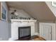 Charming white brick fireplace with decorative mantle and tiled hearth at 726 E 33Rd St, Indianapolis, IN 46205