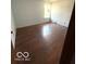 Bedroom featuring hardwood flooring and neutral walls at 7659 Misty Meadow Dr, Indianapolis, IN 46217
