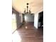 Spacious living area with sliding glass door and hardwood floors at 7659 Misty Meadow Dr, Indianapolis, IN 46217