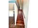 Staircase leading to second story with hardwood flooring at 7659 Misty Meadow Dr, Indianapolis, IN 46217