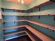 Walk-in pantry with L-shaped shelving at 8048 Garden Ridge Rd, Indianapolis, IN 46237