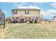 Large backyard view of this 2-story home with a covered patio and ample green space at 8218 Elsen Ridge, Avon, IN 46123
