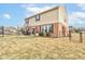 Spacious backyard featuring a patio with outdoor seating and a well-maintained lawn at 8218 Elsen Ridge, Avon, IN 46123