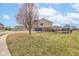 A spacious yard showing the home's side, garage, and backyard area at 8218 Elsen Ridge, Avon, IN 46123