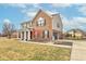 A home's exterior side view with attached garage and landscaped yard at 8218 Elsen Ridge, Avon, IN 46123