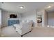 Comfortable living room with neutral tones, plush seating, and a TV at 8218 Elsen Ridge, Avon, IN 46123