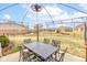 Relaxing patio with outdoor dining set beneath a gazebo and a ceiling fan overhead at 8218 Elsen Ridge, Avon, IN 46123