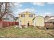 A cozy backyard featuring a fire pit, seating area, and a storage shed at 854 W Roache St, Indianapolis, IN 46208