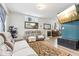 Inviting living room featuring a fireplace, stylish decor, and plenty of natural light at 854 W Roache St, Indianapolis, IN 46208