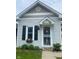 Close up of a beautifully maintained home exterior showcasing window box and entry detail at 930 Lexington Ave, Indianapolis, IN 46203