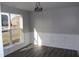 Elegant dining room with wainscoting detail, modern flooring, and large window at 1393 N Salem Ct, Greenfield, IN 46140