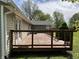 Wood deck with painted railing at 1435 E New Rd, Greenfield, IN 46140