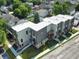 These new modern townhomes offer a rooftop deck, lush landscaping, and a contemporary design in a neighborhood setting at 1517 E New York St, Indianapolis, IN 46201