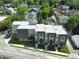 Modern townhomes offer city living with contemporary design, green spaces, and convenient street access in a neighborhood at 1517 E New York St, Indianapolis, IN 46201
