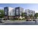 Modern townhomes featuring a combination of siding and brick, offering a contemporary and inviting street view at 1517 E New York St, Indianapolis, IN 46201