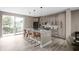 Contemporary kitchen with island seating, modern appliances, and a bright, airy atmosphere at 1517 E New York St, Indianapolis, IN 46201