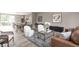 Open-concept living space with stylish furnishings, hardwood floors, and modern decor at 1517 E New York St, Indianapolis, IN 46201
