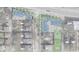 The site plan displays the layout of townhomes with 2-car garages, single Gathering lots, and neighborhood streets at 1517 E New York St, Indianapolis, IN 46201