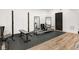 Basement area with wood flooring, workout equipment, mirrors, and a bench at 2021 Carrollton Ave, Indianapolis, IN 46202