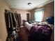 Cozy bedroom with a comfortable bed, natural light, and closet space for storage at 3000 Pearl St, Anderson, IN 46016