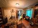 Dining room featuring hardwood floors and ample natural light at 3000 Pearl St, Anderson, IN 46016