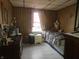 Bedroom featuring natural light, a cozy bed, and a functional study space at 3624 Columbus Ave, Anderson, IN 46013