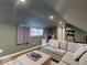 Cozy living room with a comfortable couch, natural light, and an open layout at 3659 Watson Rd, Indianapolis, IN 46205