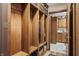 Convenient mudroom with built-in wooden cubbies and storage, ideal for organization at 4857 W Congress Cv, New Palestine, IN 46163