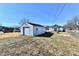 A detached garage provides covered parking and extra storage space on property at 613 S Mickley Ave, Indianapolis, IN 46241