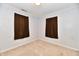 Neutral bedroom with light walls, carpeted floors, and dark curtains at 613 S Mickley Ave, Indianapolis, IN 46241