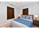 Cozy bedroom with large bed, plush linens and matching nightstands at 613 S Mickley Ave, Indianapolis, IN 46241