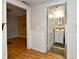 A hallway leading to a bathroom and another room, awaiting your personal touch for renovation at 613 S Mickley Ave, Indianapolis, IN 46241