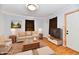 Bright living room with sofa, armchairs, and decor perfect for entertaining guests at 613 S Mickley Ave, Indianapolis, IN 46241