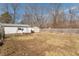Fenced in backyard with shed and swing set at 6404 W Ray St, Indianapolis, IN 46241