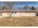 Charming single-story brick home with a well-maintained lawn and a cozy front entrance at 6404 W Ray St, Indianapolis, IN 46241