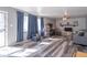 Bright living room featuring new flooring, ample natural light, and neutral color palette at 6404 W Ray St, Indianapolis, IN 46241