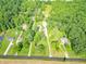 Expansive aerial view of properties surrounded by lush trees at 6602 S 400 W, Columbus, IN 47201