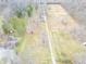 An aerial view of the long driveway and open land at 6602 S 400 W, Columbus, IN 47201