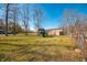 Spacious backyard with a playground and detached garage at 6602 S 400 W, Columbus, IN 47201