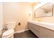 Modern bathroom featuring hexagon tile floor and a sleek vanity with a white countertop at 6602 S 400 W, Columbus, IN 47201