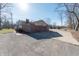 Charming two-story home with brick and vinyl siding plus an attached garage and plenty of parking at 6602 S 400 W, Columbus, IN 47201
