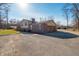 Two-story home with a two-car garage and long driveway at 6602 S 400 W, Columbus, IN 47201