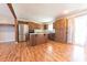 Modern kitchen with stainless steel appliances, wood cabinets, and a convenient kitchen island at 6602 S 400 W, Columbus, IN 47201