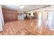Bright, open-concept living room with wood-look flooring, ideal for entertaining guests at 6602 S 400 W, Columbus, IN 47201