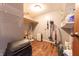 Functional storage room features wood-look flooring and shelving; ideal for organizing household items at 6602 S 400 W, Columbus, IN 47201
